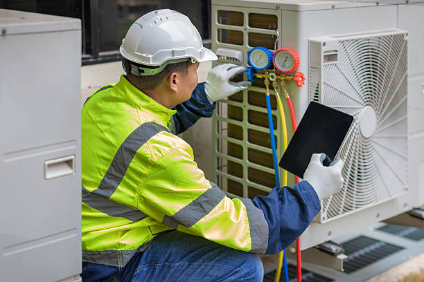 Professional Air Duct Cleaning technician working in Denham Springs, LA